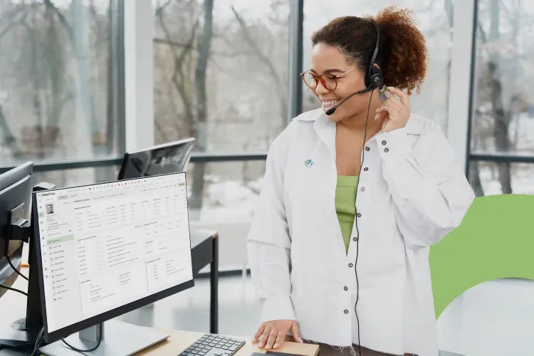 Apex RCM support specialist on a headset